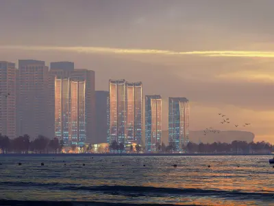 Sunset Waterfront Skyline with Modern Glass Towers 3D model