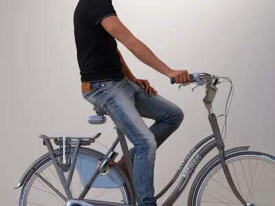 Pre-posed 3D man on a bike with realistic hair 3D model
