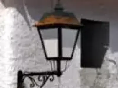 Torch street lamp on side of building Free 3D model