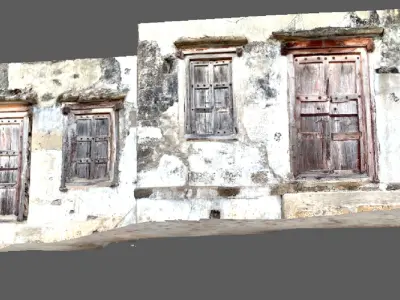 A ruined house wall with windows on sides  doors in the center 3D model