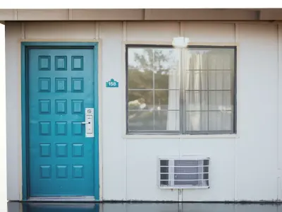 Teal Wooden Door Beside Window Low-poly 3D model