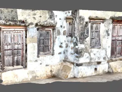 A ruined house wall with windows on sides  doors in the center 3D model