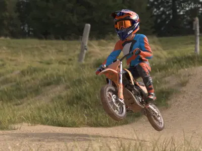  KTM Kids Dirt Bike Rider Mud Splashed Attack Stance 