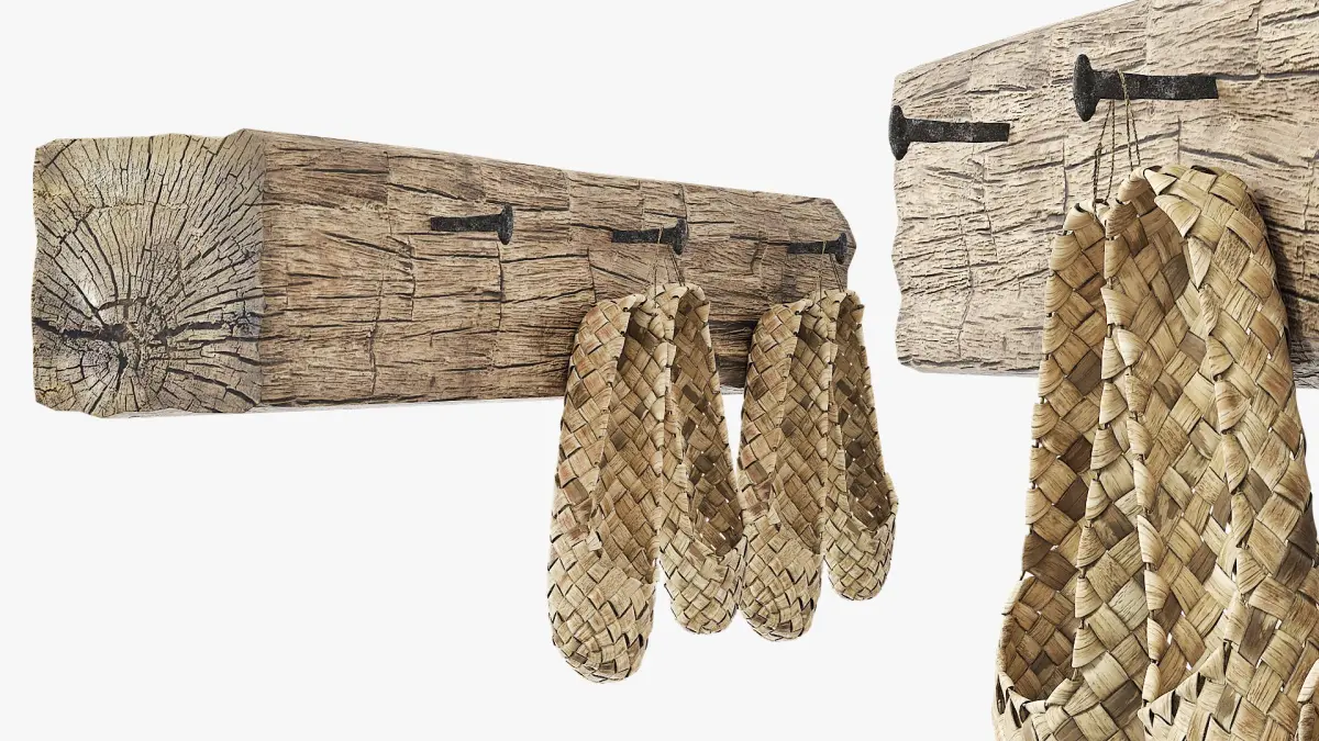 Aged Bast Shoes Hanging on Old Timber 3D model