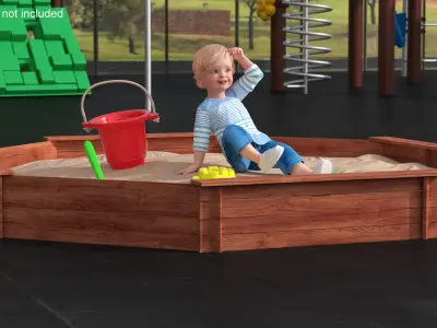  Small Child Playing in a Sandbox 