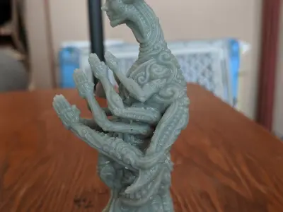 Greeter statue of woman on wooden table 3D print model