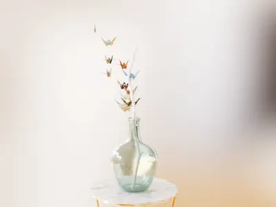 Large glass carboy with decorative origami birds 3D model