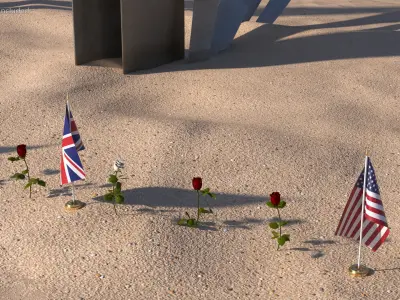 Les Braves Memorial with Allied Flags and Flowers 