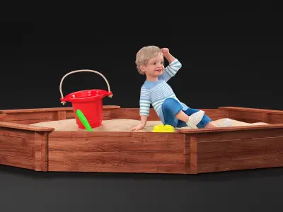  Small Child Playing in a Sandbox 