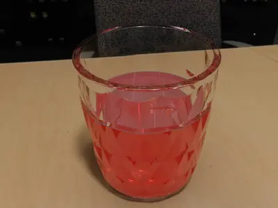 Cup glass of liquid on table Free 3D model