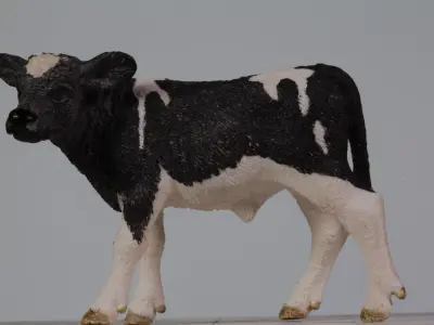 plastic miniature cow Free 3D model
