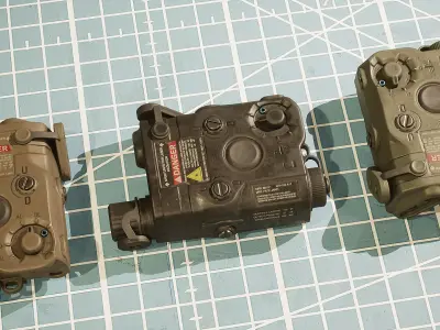 ANPEQ15 three military devices on cutting mat Low-poly 3D model