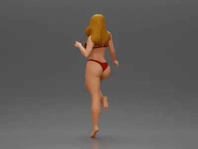 Stylized female figure posed dynamically in minimal attire 3D print model