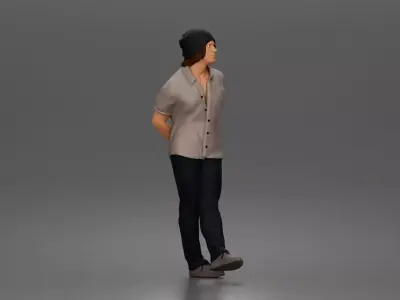 Relaxed young man in beanie standing casually with hands behind 3D print model