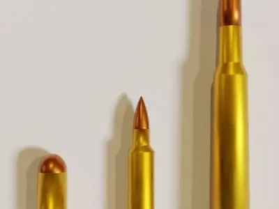 Low-poly Ammo three gold bullets Free low-poly 3D model