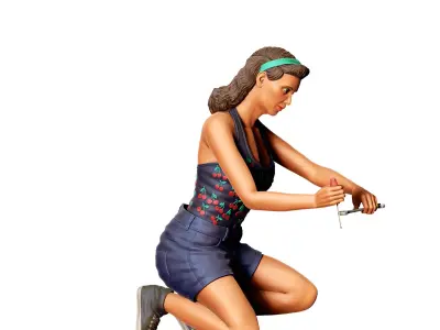 A woman working on a VW Beetle 3D print model