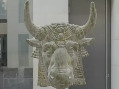 Ox head in rock material Free low-poly 3D model