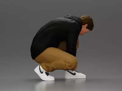 Man in hoodie crouching down tying shoelaces focused 3D print model