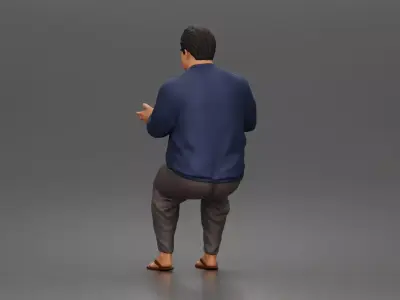 Asian Man sits gesturing while wearing casual sweater pants 3D print model