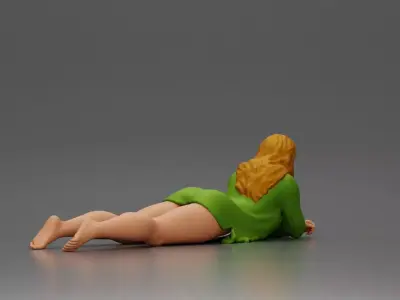Girl with long hair in green dress lying with calm on the beach 3D print model