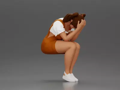 Crying girl sitting low in orange dress with head in hands 3D print model