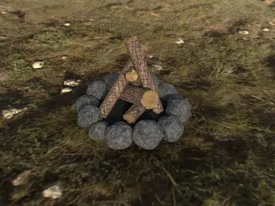 Campfire fire pit in grass Free low-poly 3D model