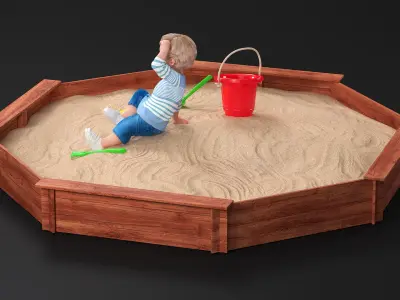  Small Child Playing in a Sandbox 