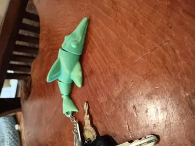 Flexi Dolphin Keychain - articulated - print in place  Free 3D print model