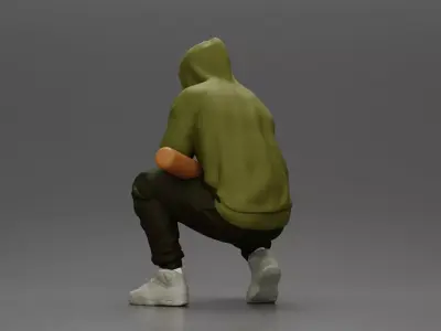 Gangster crouching low in green hoodie holding bat planning move 3D print model