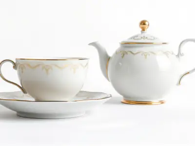 Elegant Vintage Porcelain Tea Set with Floral Engravings Low-poly 3D model