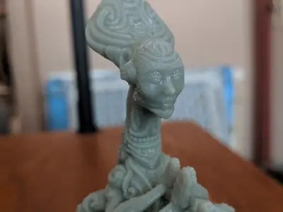 Greeter statue of woman on wooden table 3D print model