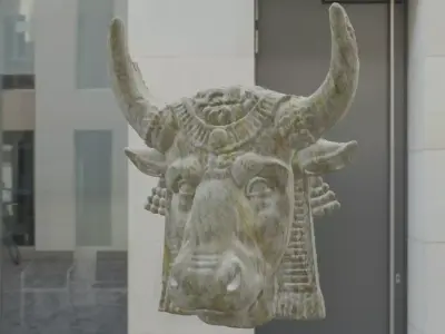 Ox head in rock material Free low-poly 3D model