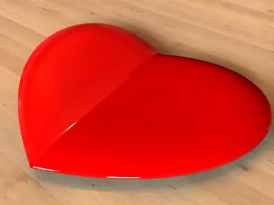 Heart model on wooden table Free 3D model