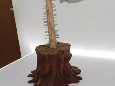 Curved hammer full of nails 3D print model