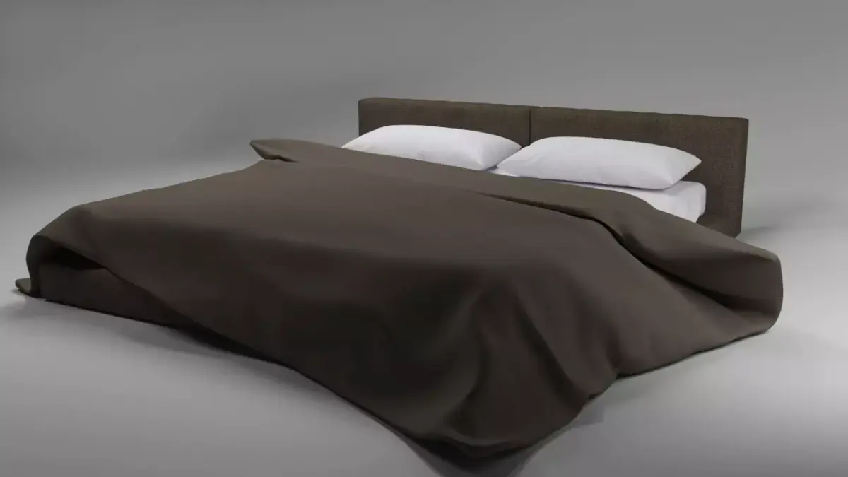 Large bed in a modern style with a blanket and pillows Free 3D model