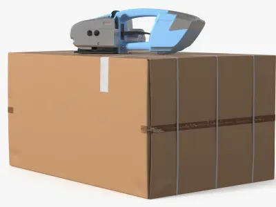 Cordless Welding Strap Tool on Cardboard Box 3D model