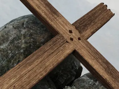 Simple wooden cross on top of boulders Free 3D model