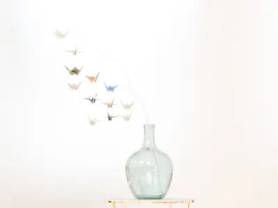 Large glass carboy with decorative origami birds 3D model