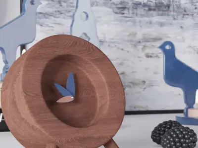 Decorative set 4 bird figurines and book on table Free 3D model