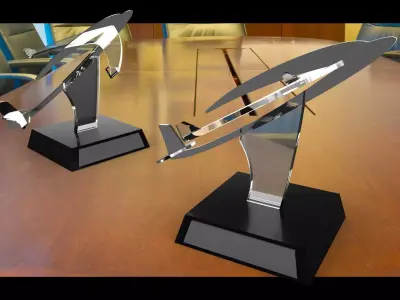trophie two airplane trophies on table Free 3D model