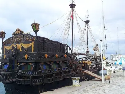 Galleon Model wooden pirate ship floating in water 3D model