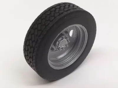 Printable 2-hole front and rear truck wheels with tires 3D print model
