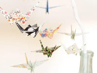 Large glass carboy with decorative origami birds 3D model