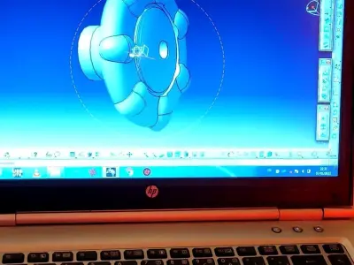 3d mechanical model person using laptop with design Free 3D model
