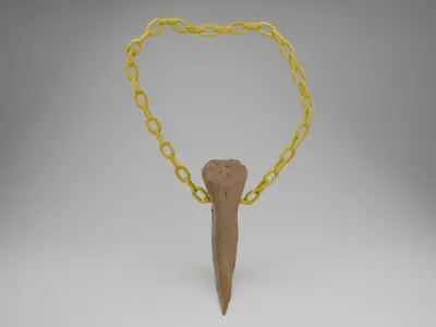A golden chain with a dinosaur claw Free low-poly 3D model