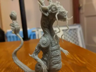 Lizard dragon figurine on table 3D print model