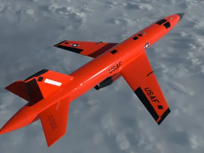 BQM-167A orange military jet flying in sky 3D model