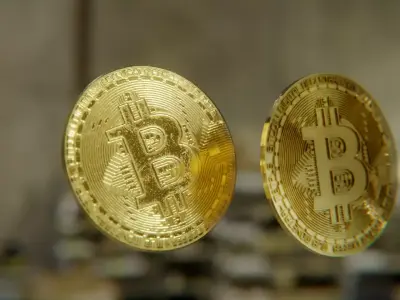Bitcoin two gold bitcoins on table Low-poly 3D model