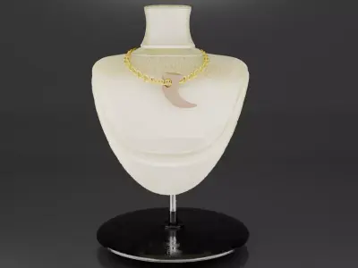 A golden chain with a dinosaur claw Free low-poly 3D model